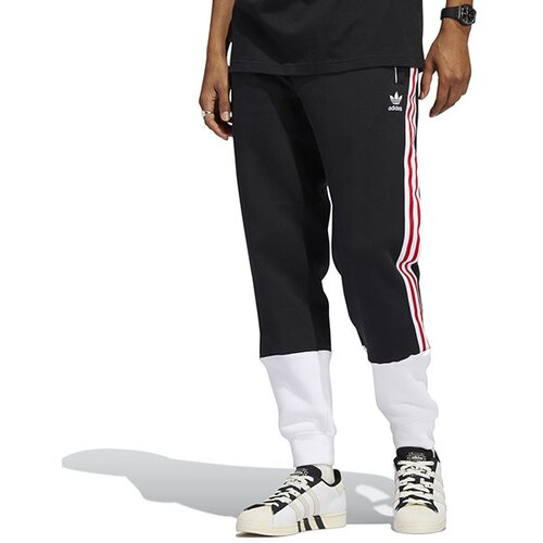 Adidas muški donji deo trenerke sst fleece HC2082 Slike