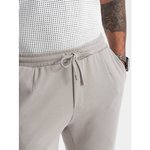 Ombre Men's knit pants with elastic waistband - light grey Cene