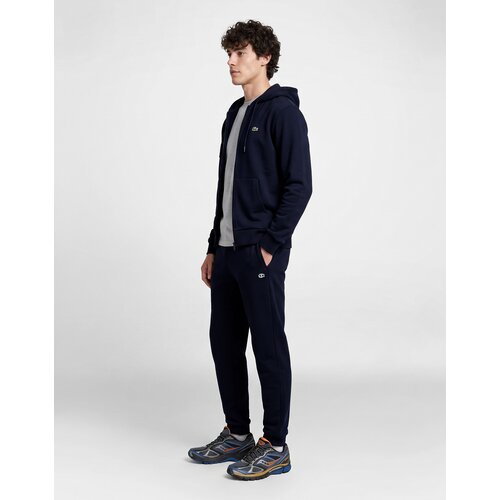 Lacoste Spodnji deli trenirke Pantalon de surv&amp;ecirc;tement en molleton tapered fit pisana Slike