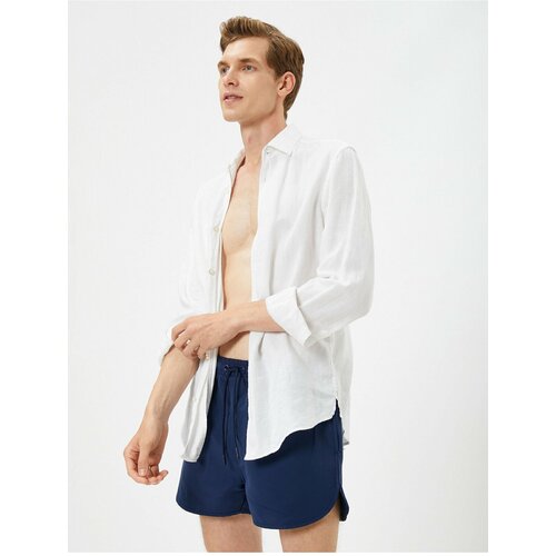 Koton Swimsuit Shorts Short waist with a tie-down pocket. Cene