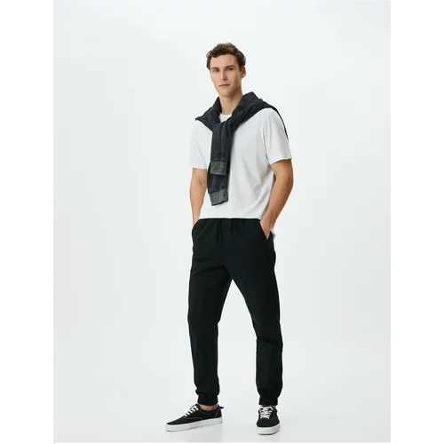 Koton Jogger Trousers with Lace Waist Slim Fit Pocket Detail