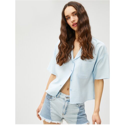 Koton Short-Sleeved Shirt with a relaxed fit, pocket detail and button fastening. Slike