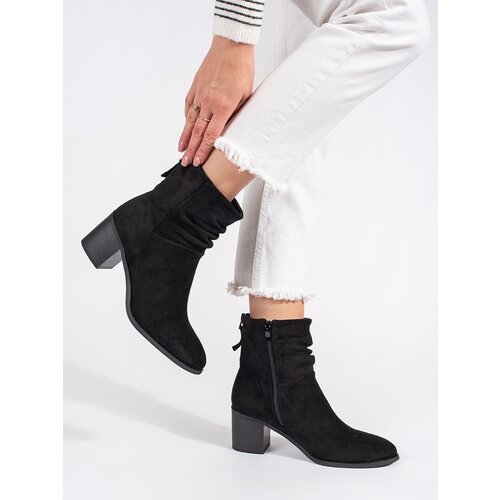 Shelvt Women's black suede boots with a ruffled upper Cene