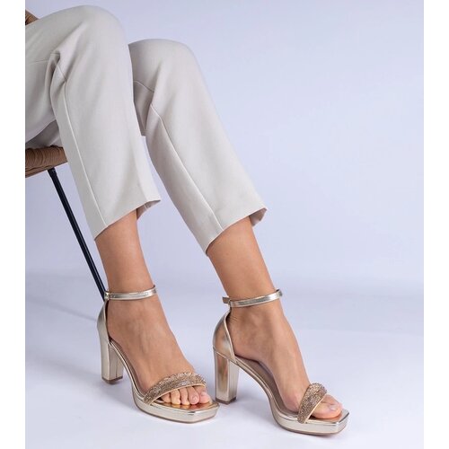 D/CEO marka niezdefiniowana Gold elegant sandals with a heel and rhinestones Beltusto Cene