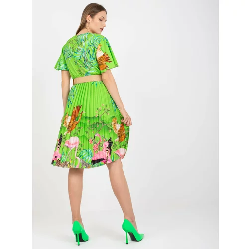 Fashion Hunters Light green dress with prints and a braided belt