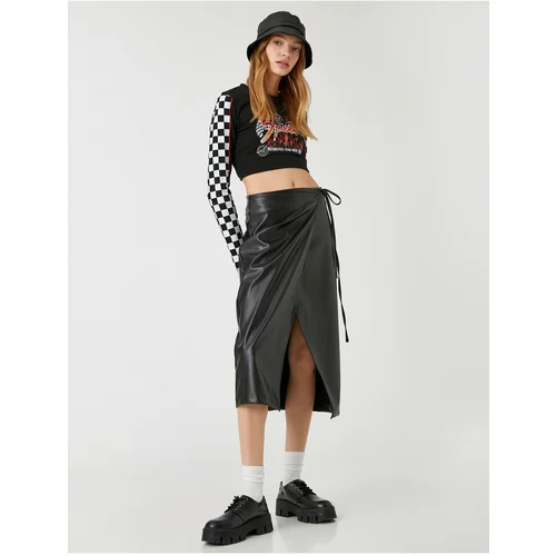 Koton Midi Skirt with Deep Slits and Wrapover Fastening with a Leather Look.