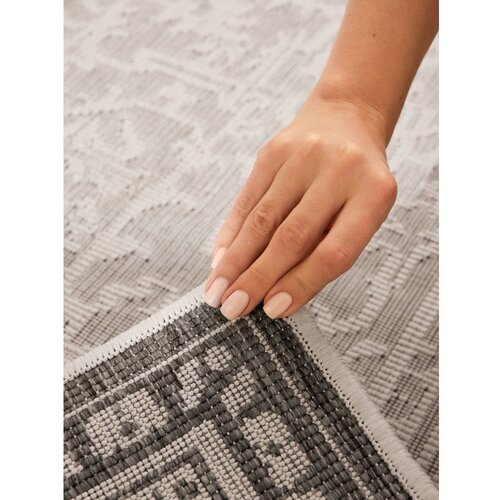 NORTHRUGS Sivo-slonoko&amp;scaron;čena notranja in zunanja preproga 120x170 cm Duet Kona &amp;ndash; Slike