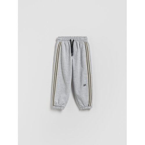 Reserved Pamučne jogger hlače - svijetlo siva Cene