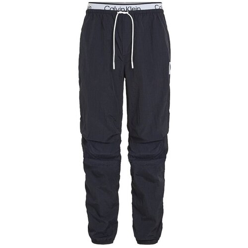 Calvin Klein Jeans Spodnji deli trenirke Wo Woven Črna Cene