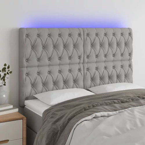 vidaXL LED posteljno vzglavje svetlo sivo 144x7x118/128 cm blago