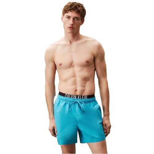 Calvin Klein Jeans Kopalke / Kopalne hlače KM0KM01093 Modra Slike