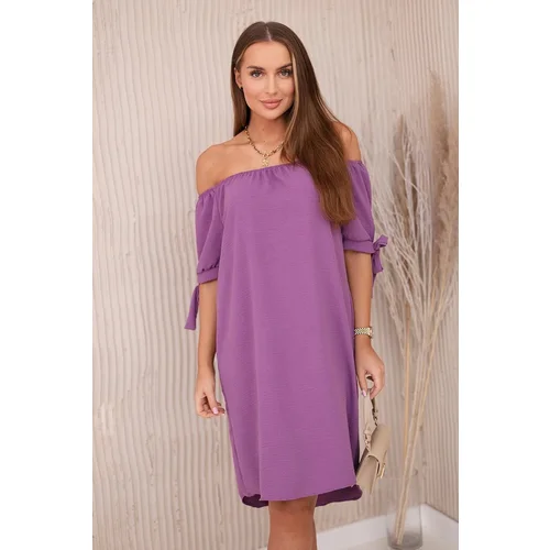 Kesi Dress with a longer back and ties on the sleeves plum