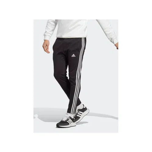 Adidas Spodnji del trenirke Essentials Single Jersey Tapered Open Hem 3-Stripes Joggers IC0044 Črna Regular Fit