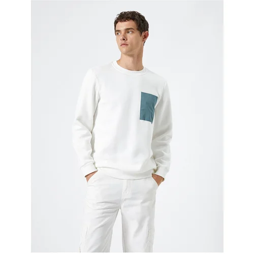 Koton Crew Neck Sweatshirt with Pocket Detail, Ribbed Long Sleeves.