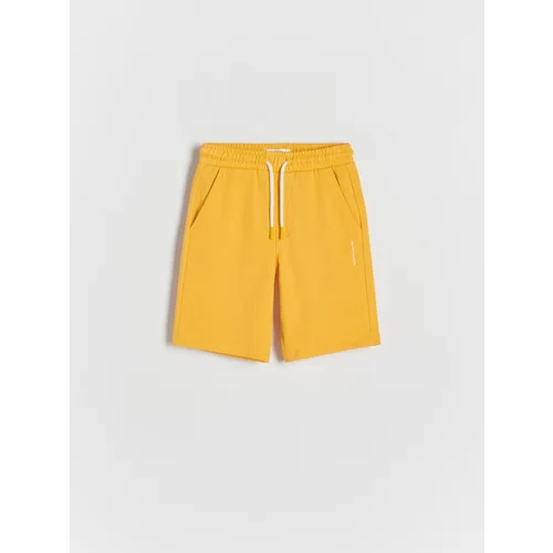 Reserved - Pamučne kratke hlače s džepovima - žuta boja