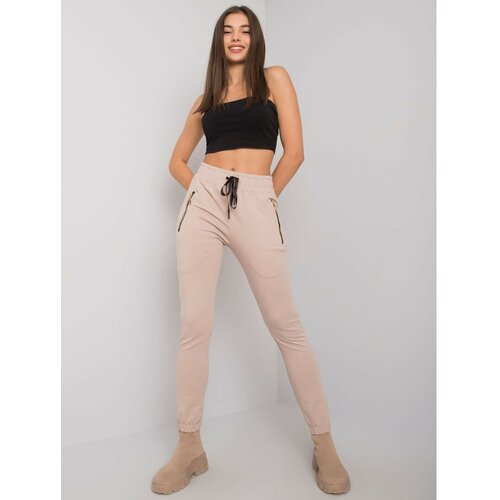 Fashion Hunters Light beige women's sweatpants with pockets Slike