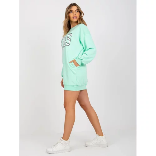 Fashion Hunters Light green oversized sweatshirt with a print