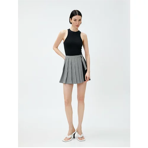 Koton Pleated Mini Skirt with Contrast Detail Belt.