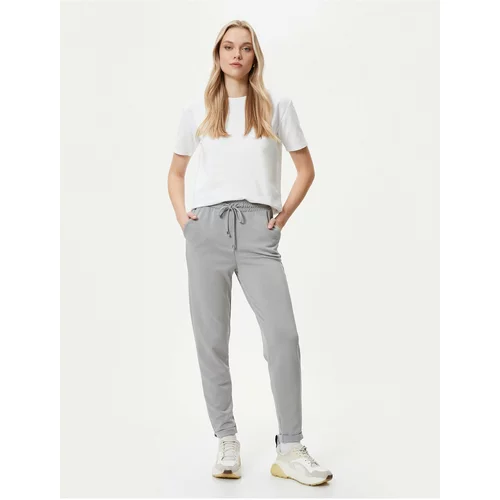 Koton Jogger Trousers with Lace Waist and Pocket Modal Blend