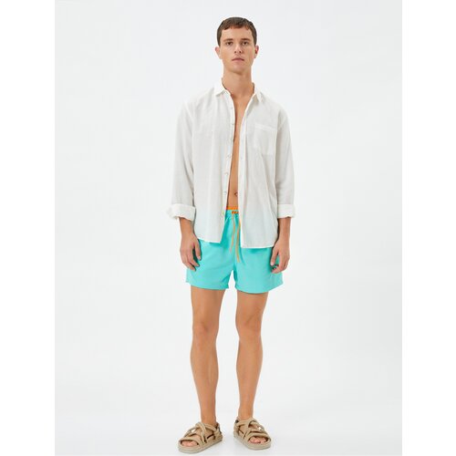 Koton Shorts Marine Shorts with a lace-up waist with pockets. Slike