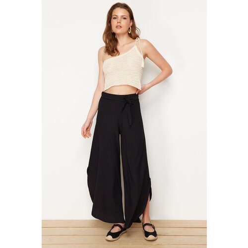 Trendyol black short wide leg flexible trousers with side slits Cene