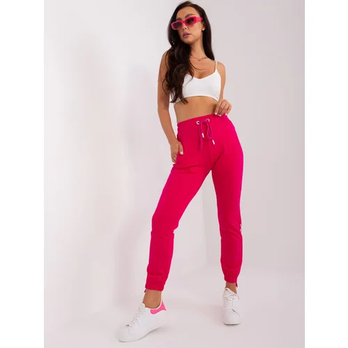 Fashion Hunters Fuchsia women's sweatpants with inscriptions