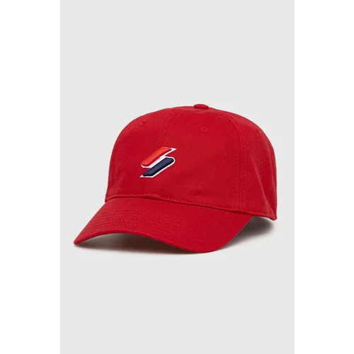Superdry Bombažna kapa rdeča barva
