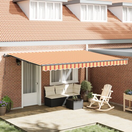 VidaXL Ročna retraktibilna tenda v rumeni in oranžni, 450x300 cm. Slike