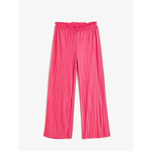 Koton The Trousers Have Wide Leg, Comfortable Cut. The waist is elasticated.