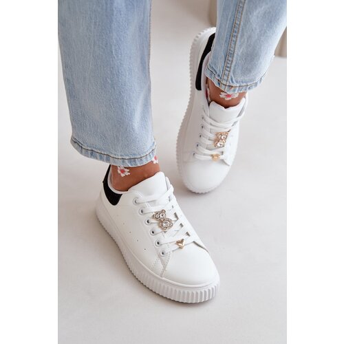 Kesi Low sneakers made of eco-leather with badges - white and black Cillione Slike