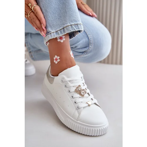 Kesi Low sneakers made of eco-leather with badges - white and silver Cillione