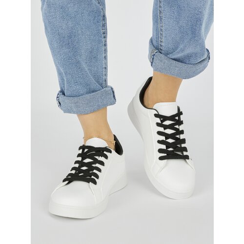 Shelvt White women's trainers Cene