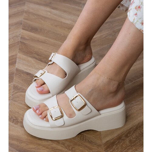 Gemre White slides with buckles on straps Wollis Cene