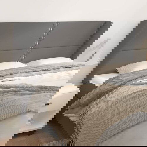vidaXL Vzglavje z ušesi sivo 183x23x118/128 cm umetno usnje Cene
