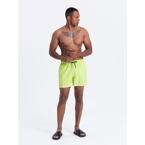 Ombre Neon men's swim shorts with magic print effect - lime green Cene