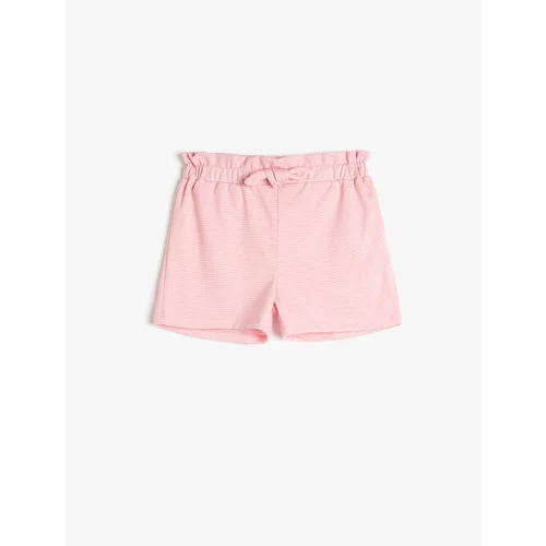 Koton The shorts have an elasticated waist with a bow.
