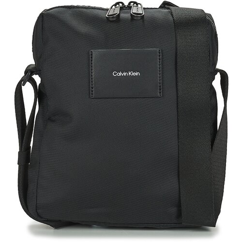 Calvin Klein Jeans Torbice CK MUST T REPORTER Črna Cene