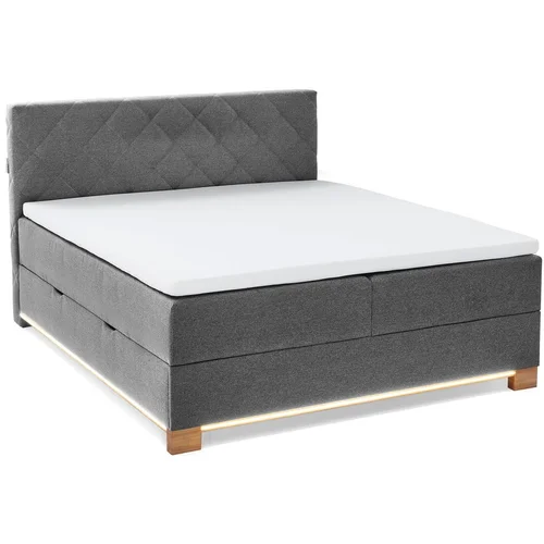 Meise Möbel Sivi boxspring krevet s prostorom za odlaganje 160x200 cm Messina –