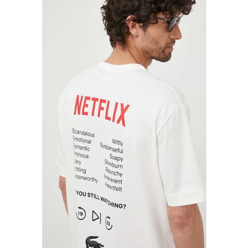 Lacoste Bombažna kratka majica x Netflix bela barva Slike