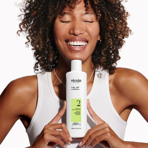 Nioxin System 2 Scalp + Hair Conditioner balzam proti redčenju las 300 ml Slike