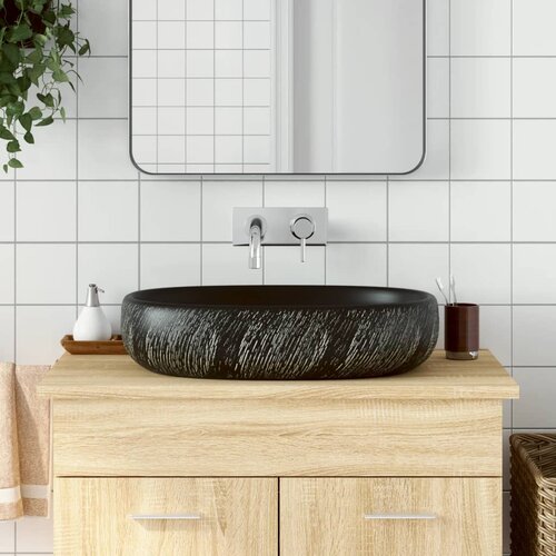 Nadgradni umivaonik crni ovalni 59x40x14 cm keramički Slike