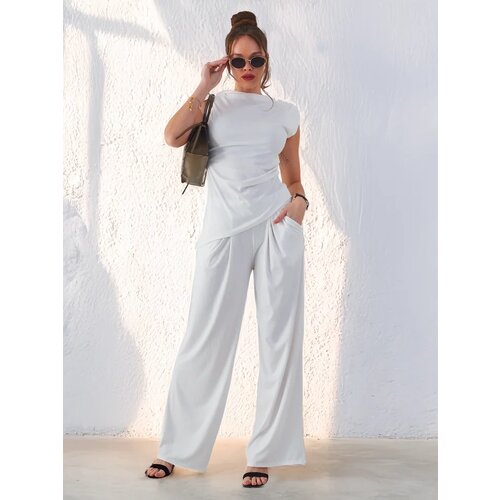 Resti Women's ribbed set, with an asymmetrical sleeveless top and flared pants Cijene