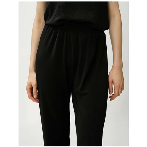 Koton Elastic Waist Trousers with Slits, flared legs