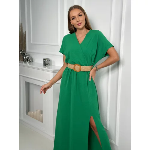Kesi Long dress with a decorative belt of green color
