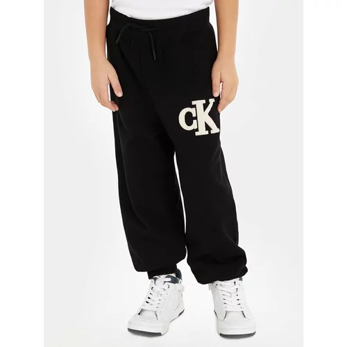 Calvin Klein Jeans Spodnji del trenirke Towelling Logopack IB0IB01677 Črna Regular Fit