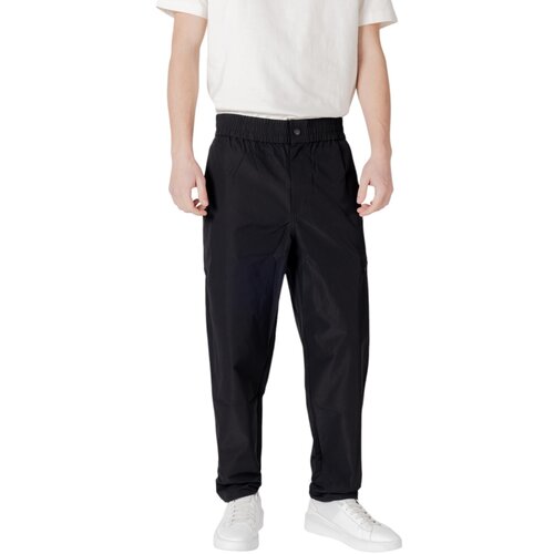 Calvin Klein Jeans Hlače Chino / Carrot TRACK PANT J30J326884 Črna Cene