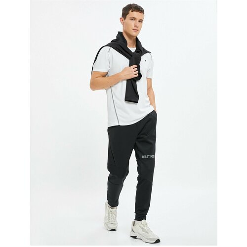 Koton Jogger Sweatpants with Pockets, Tie Waist and Print Detail. Cene