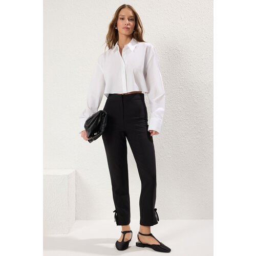 Trendyol Black Cigarette Legs Bow Detail Woven Trousers Cene