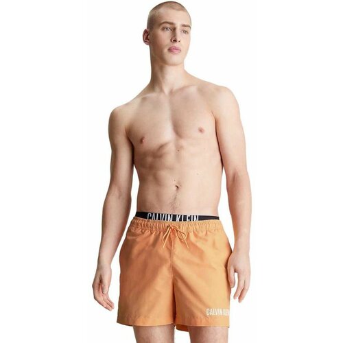 Calvin Klein narandžasti muški kupaći CKKM0KM00992-SAN Slike