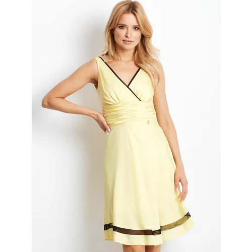 Fashion Hunters Yellow dress with V-neck and mesh trim